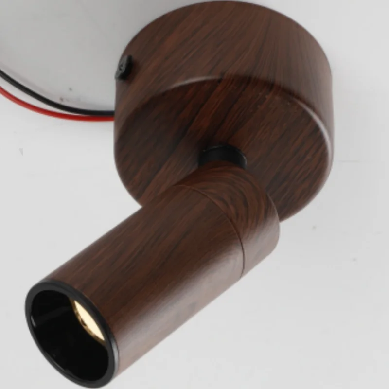 A cluster of bright spotlights in a medieval style, with walnut wood texture and a small-angle design