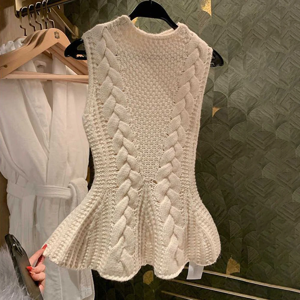 

Korean knitted waist a-shaped pendulum sleeveless top spring inner niche pure desire sexy hot girl knitted top women's clothing