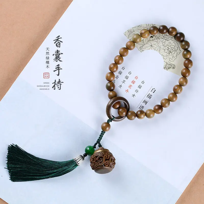 

UMQ Natural Green Sandalwood Handheld Handstring Carved Hollow Sachet Lotus Running Ring Tassel All-Match Wooden Bracelet