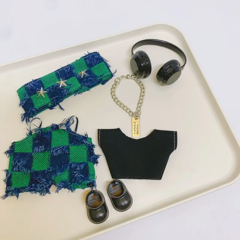 Mode nouveaux vêtements pour bébé de 17 Cm 123 générations devant le changement de costume de vêtements en peluche en vinyle de poupée en tissu à haute énergie. Vêtements de poupée