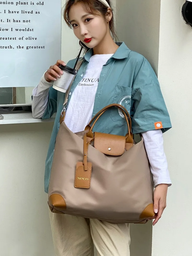 Viaggi corti da donna leggera grande capacità al di fuori del lavoro pendolarismo Tote monospalla elegante stile semplice