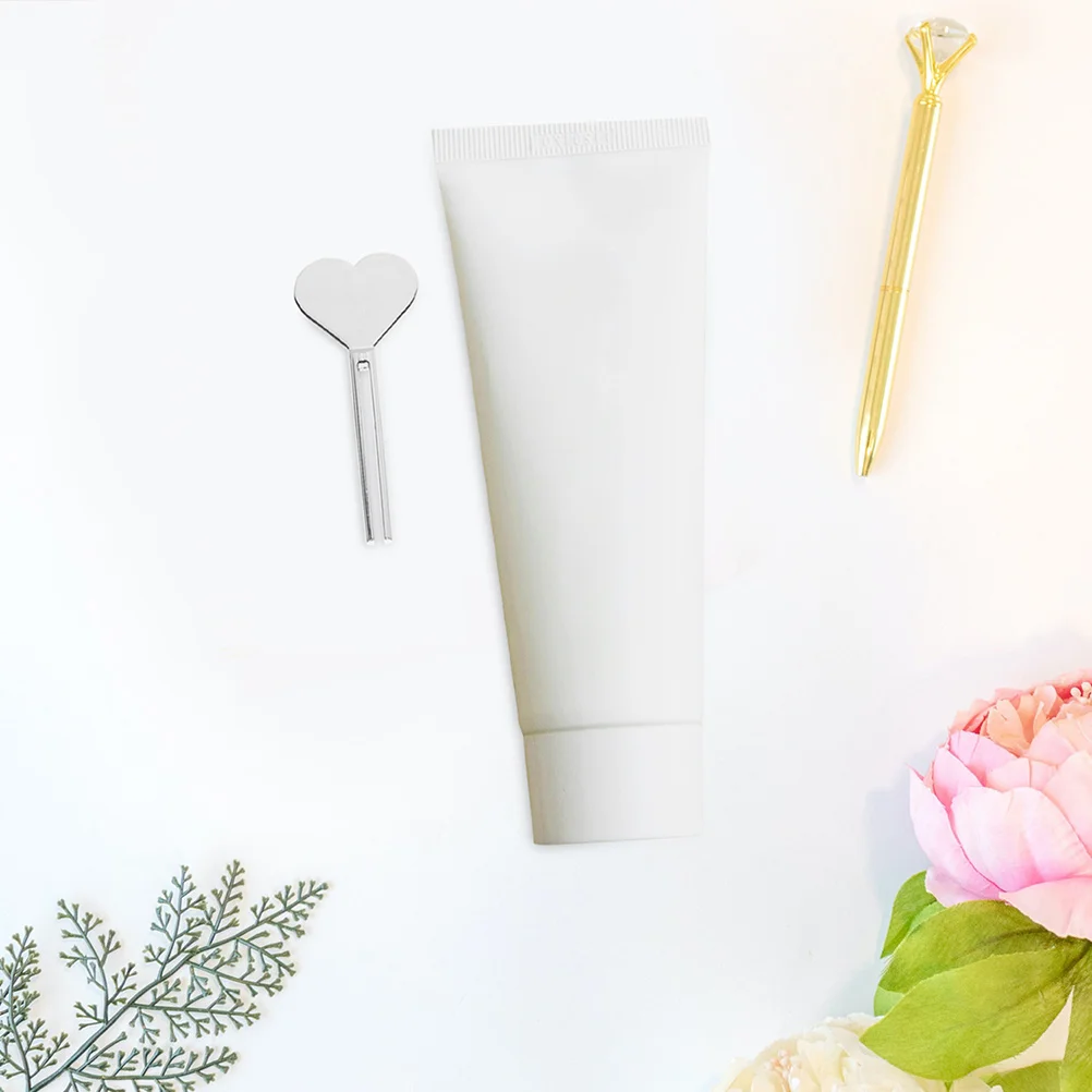 

4pcs Alloy Toothpaste Squeezer Compact Manual Dispenser Heart Tube Silver Heart Shape Tube Roller Bathroom Travel