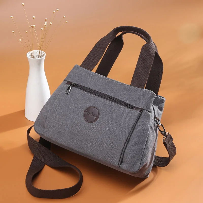 

Canvas Handheld Multi Pocket Large Capacity Casual Bag Solid Color Retro Casual Simple Shoulder Bag Diagonal Straddle Bag