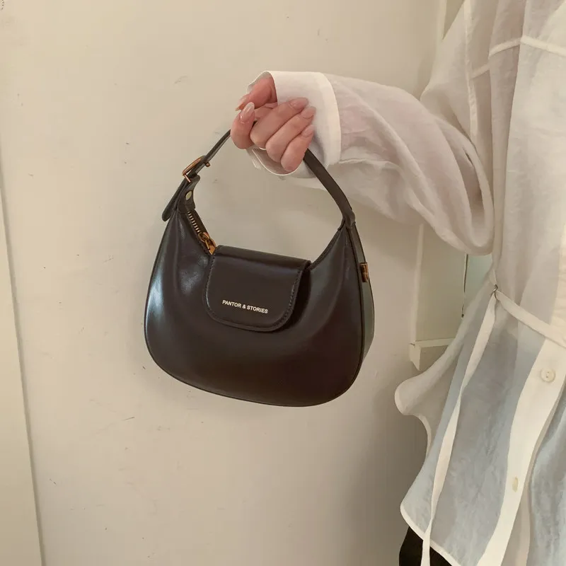 

Female Letter PU Handbags Textured Large Capacity Shopping Crossbody Bags 2026 New Commuting Zipper Moon Shoulder Bag