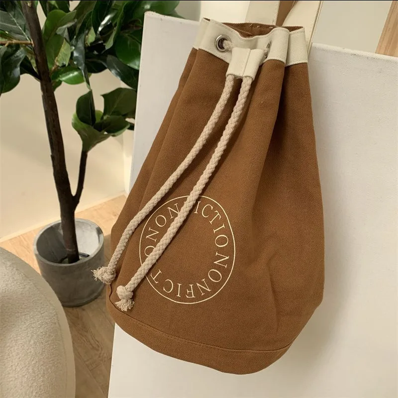 Versione coreana zaino Messenger monospalla borsa in tela con coulisse borse per la spesa di grande capacità borsa a secchiello per studenti