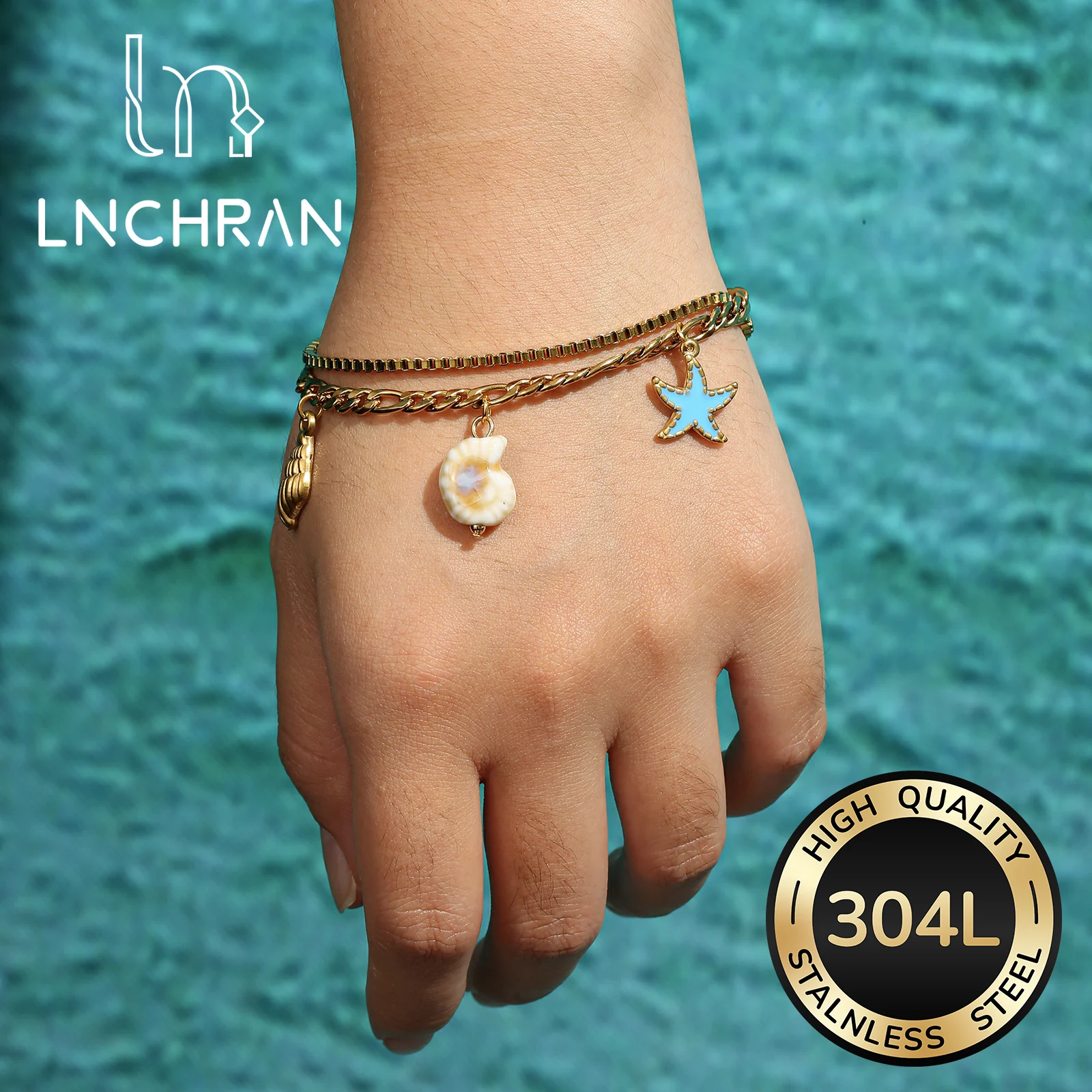 Golden Tone Stainless Steel Ocean Charm Bracelet with Dolphin Starfish and Shell Pendants for Women