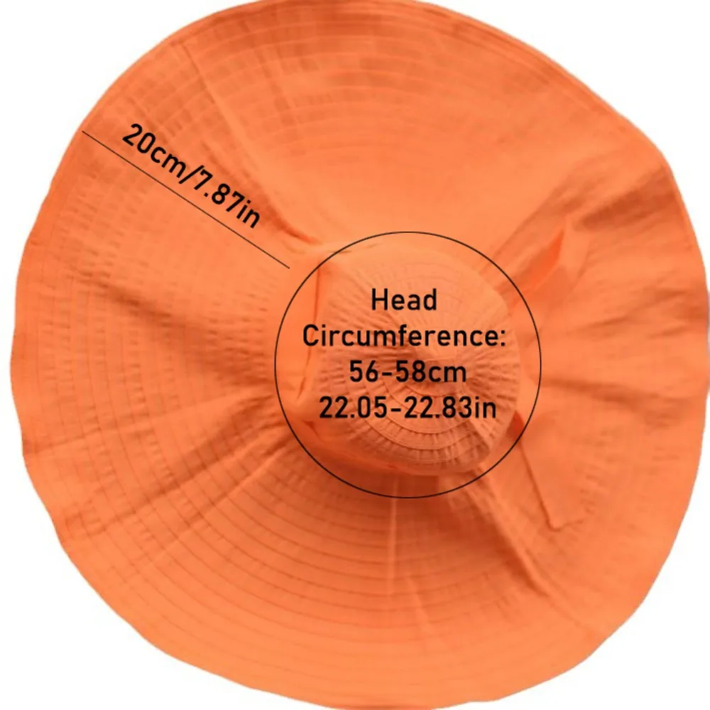 قبعة قابلة للتعبئة بعقدة على شكل فيونكة قابلة للتشكيل ذات حافة واسعة واقية من الشمس وقابلة للطي من البلاستيك قبعة دلو للأشعة فوق البنفسجية ومضادة للتنفس للنساء قبعة الشمس للشاطئ
