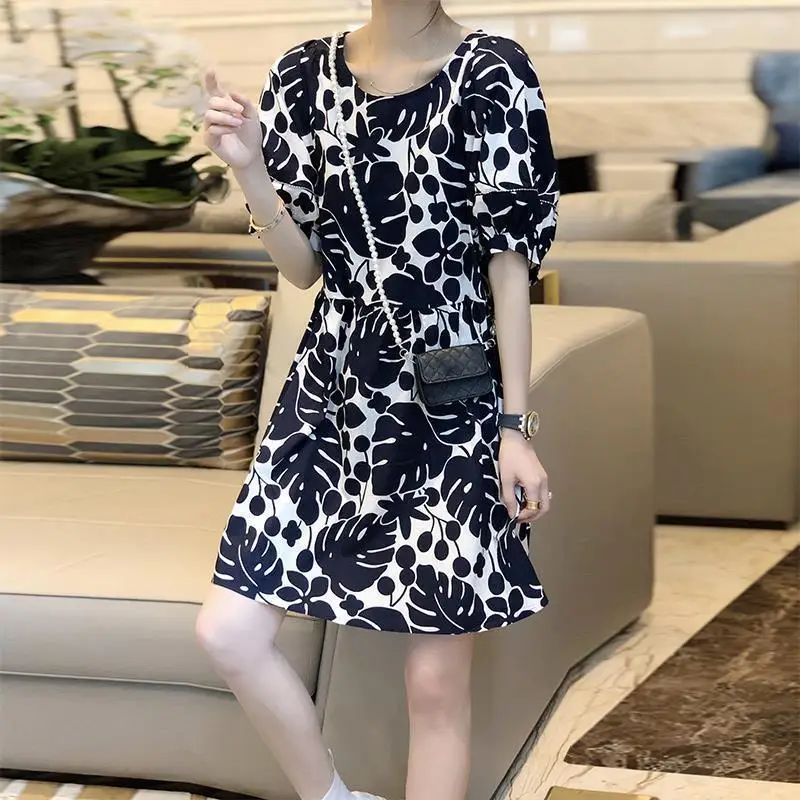 เสื้อผ้าสตรีแฟชั่น Vintage พิมพ์ชุด Midi ฤดูร้อนพัฟแขนตัด Casual Spliced รอบคอ A-Line Dresses