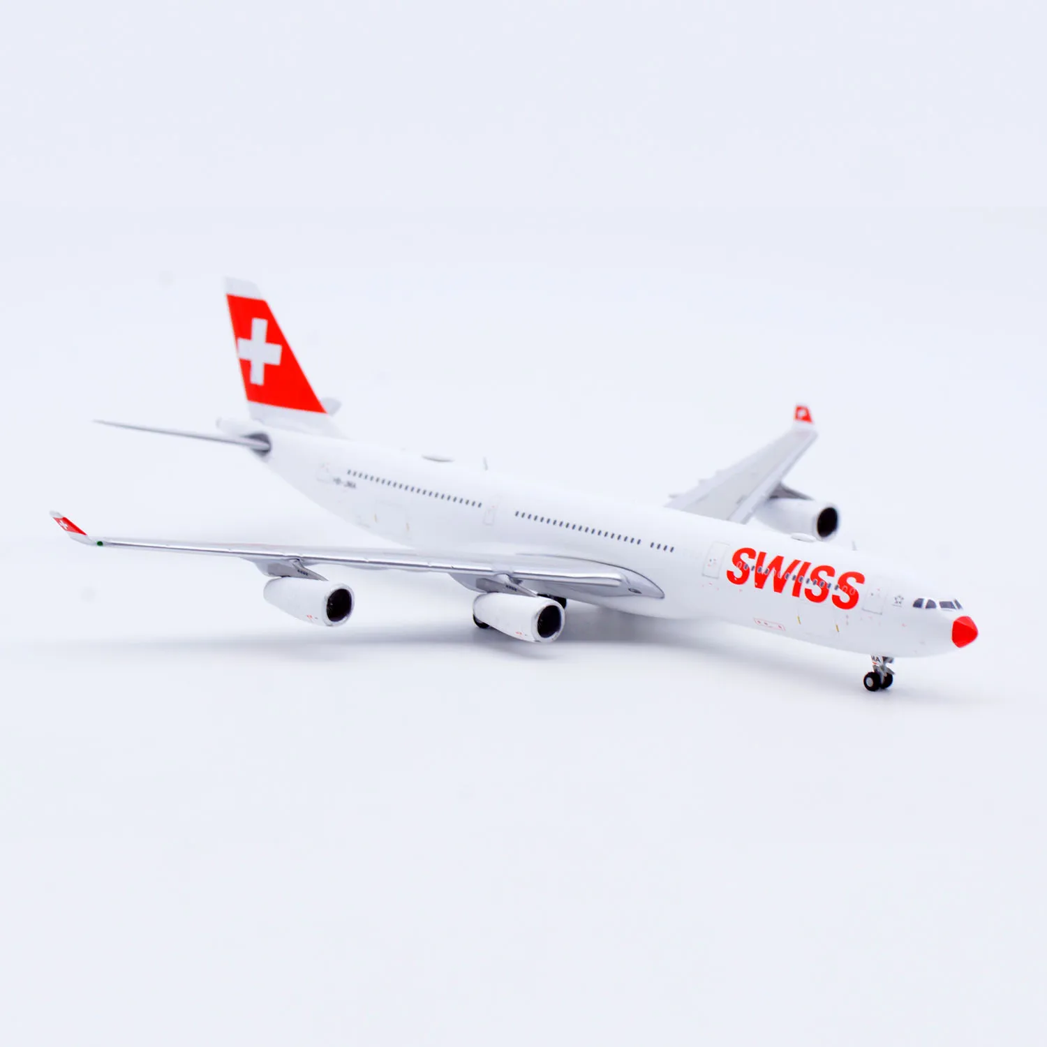 XX40203 โลหะผสมสะสมเครื่องบินของขวัญ JC ปีก 1:400 Swiss "จมูกสีแดง" Airbus A340-300 เครื่องบิน Diecast Jet รุ่น HB-JMA