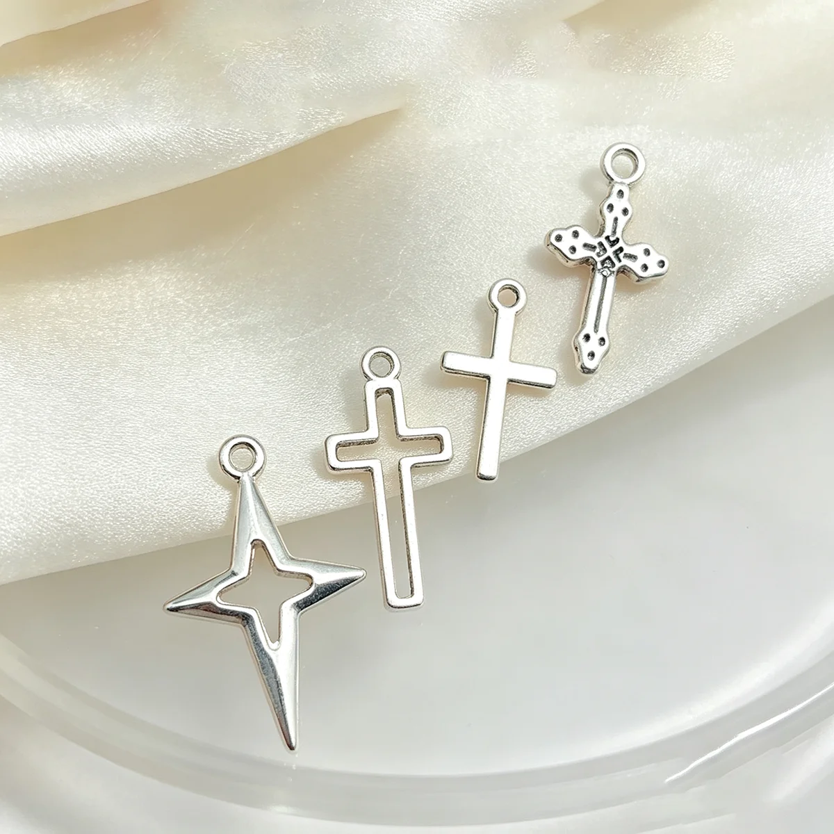 28-Piece Set of Cross-Shaped DIY Handmade Accessories, Featuring Hollow Cross Patterns, Simple Vertical Crosses, and Four-Pointed Star Shapes, Suitable for DIY Bracelets, Necklaces, Earrings, Pendants, and Handmade Beaded Decoration Accessories