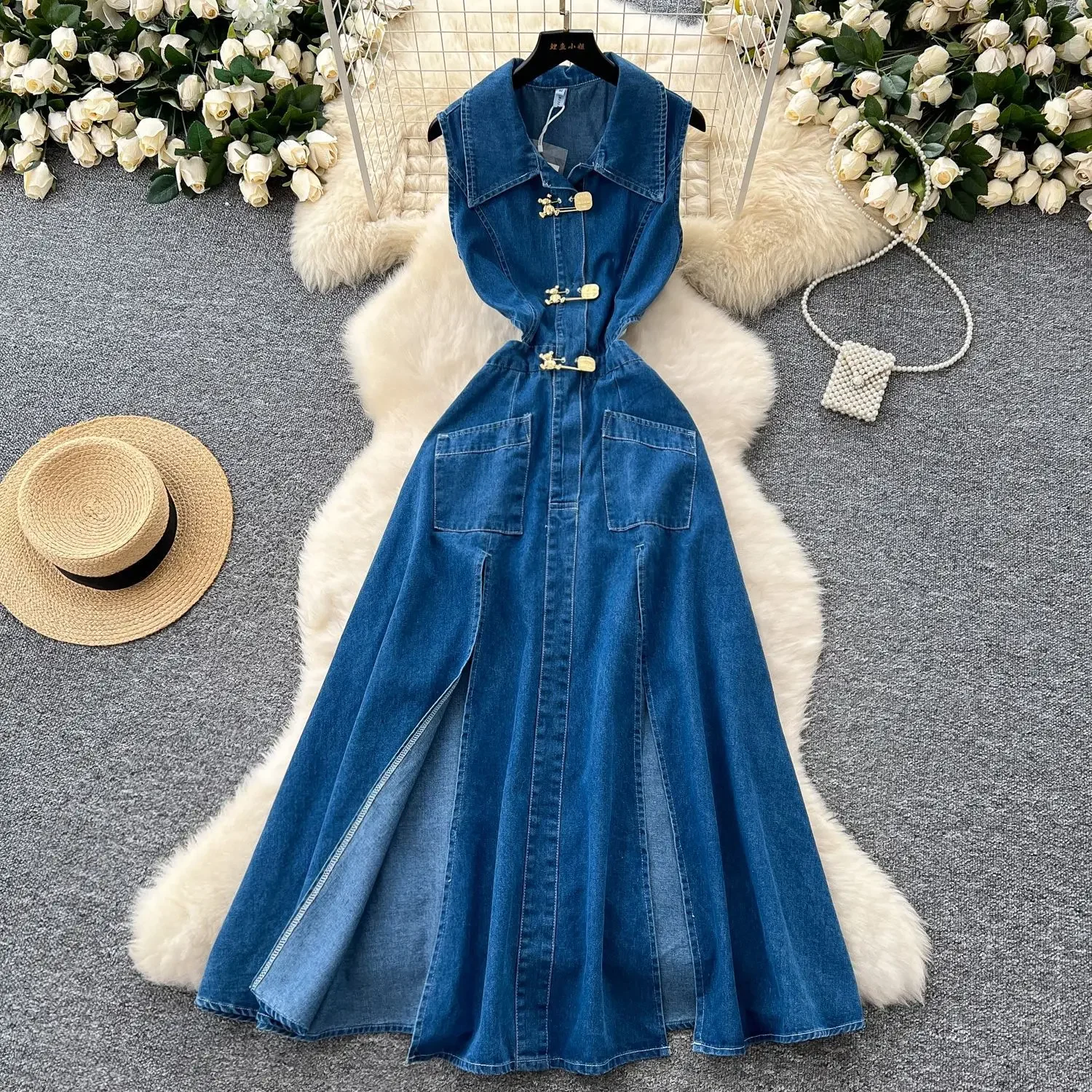 

Summer 2025 New Fashion Denim Women Long Dress. A Women's Design-sense Hollowed-out Expose The Waist Sleeveless Lapel Slit Dress