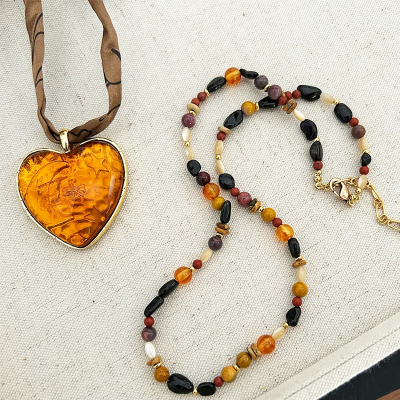 

Vintage Heart Amber Pendant Scarf Necklace for Women, Niche Luxury Style Accessory.