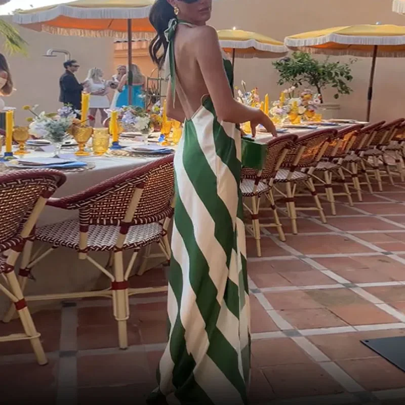 Elegantลายจีบวันหยุดชุดผู้หญิงแฟชั่นHalterชุดยาวแขนกุดฤดูร้อนใหม่เซ็กซี่Backless Hollow Out Boho Robe