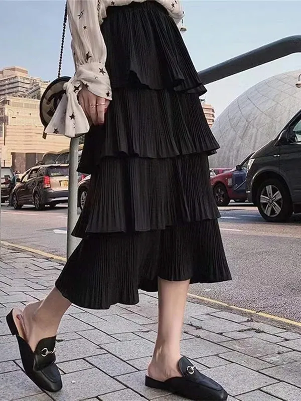 Gonna a pieghe con orecchie in legno Vita elastica Torta Sle f-lunghezza Streetwear da donna Gonna a vita media con giuntura in puro colore