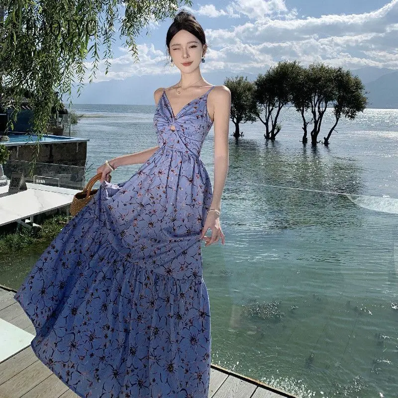 

Summer seaside vacation super new hollow design temperament V-neck floral suspender dress women