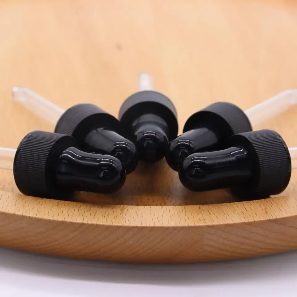 Bottiglia di plastica in vetro Tinture per essenza di olio con testa di colla Tappo a vite in plastica nera Contagocce per olio essenziale per bottiglia di vetro boston