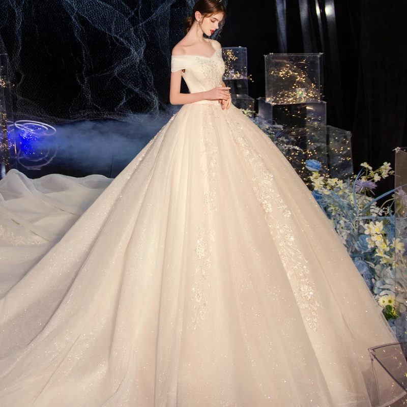 Abito da sposa leggero, velo principale della nuova sposa, temperamento lussuoso, stile palazzo monospalla, abito da sposa con strascico del cielo stellato