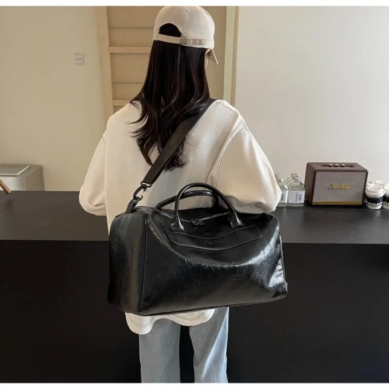 PU Zipper 2024 borsa da viaggio di alta qualità tinta unita borsa a tracolla Casual di grande capacità morbida e Versatile borsoni da viaggio alla moda