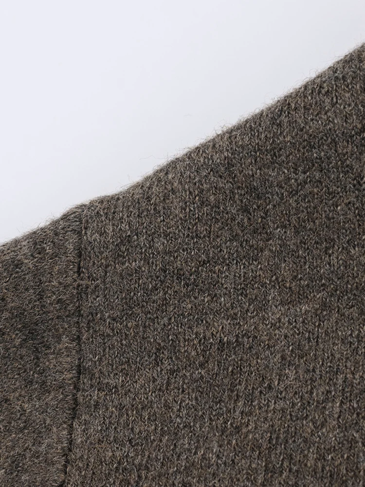 European-style new women's fashion, versatile, elegant, casual cape-style round neck long-sleeved sweater coat.