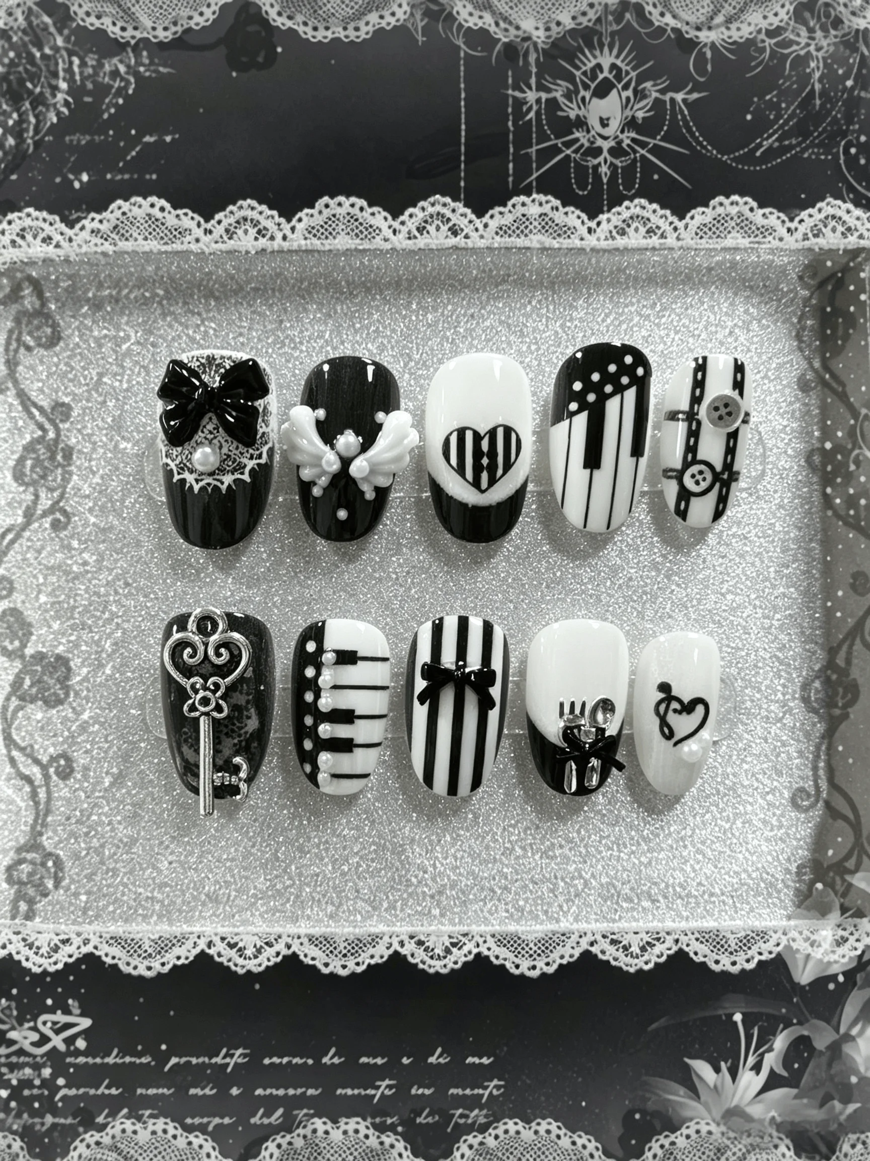 10 Pieces of Handmade Oval Full-Cover Nail Tips, Medium Length, Black and White Contrasting Piano Key Pattern with 3D Bow, Metal Key, Heart-Shaped Musical Notes, and Pearl Embellishments, in a Retro Music Sweet-Cool Style, Lace Elements, Dark Gothic Style, Perfect for Girls, Unique Outfits, and Party Scenes, Suitable for Halloween, Back-To-School Season, Ideal as a Gift, Includes 1 Piece of Jelly Glue and 1 Nail Tool
