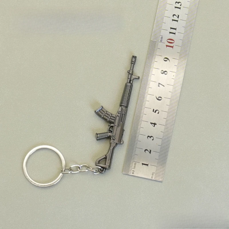 9cm/3.54in Peace Game peripheral Mini Gun Keychain M4A1 Barrett Metal Gun Weapon Model Backpack charm Fine Crafts Boys Gift Toys