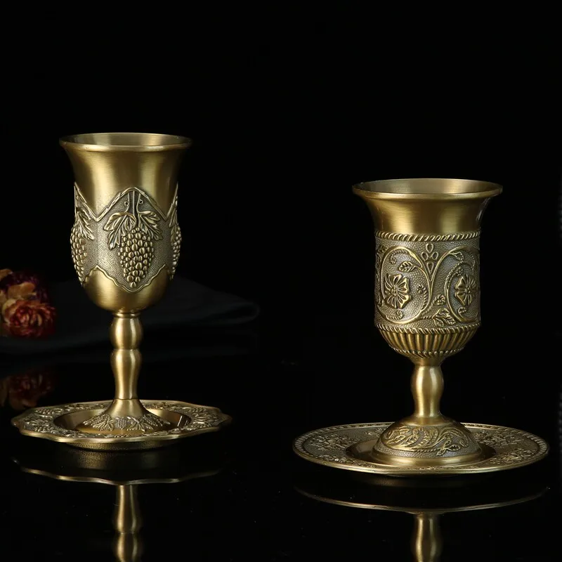 Elegant vintage-inspired metal goblet set featuring retro European design ideal for white and red wine service photography props
