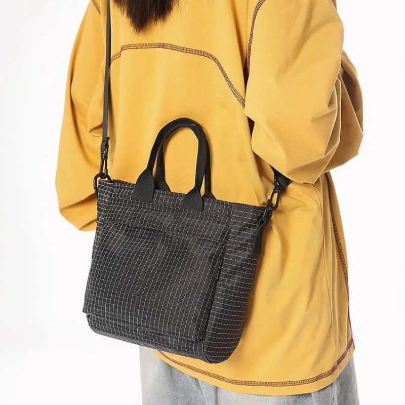 

High-Quality Crossbody Bag For Women In Genuine Leather With Messenger Feature By Famous Designer