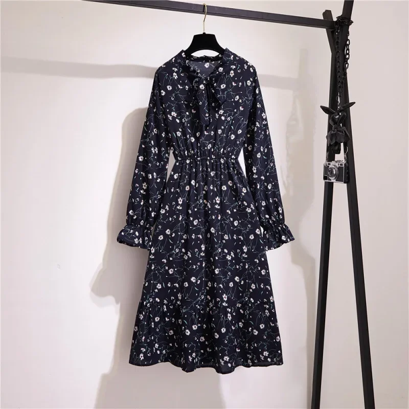 Lotus leaf edge floral dress for women in spring and autumn, with a waist cinching temperament and a bow tie tie as a base skirt