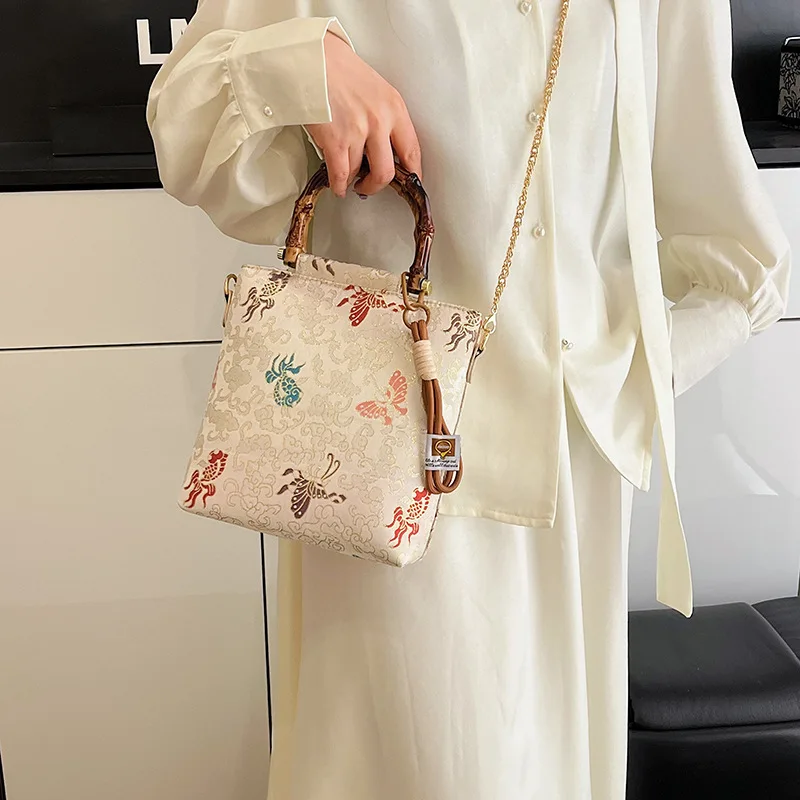 

Women's Crossbody Bucket Bag 2025 Summer Lightweight Anti-Theft Bamboo Tote Bag National Style for Travel/Office/Casual Outfit