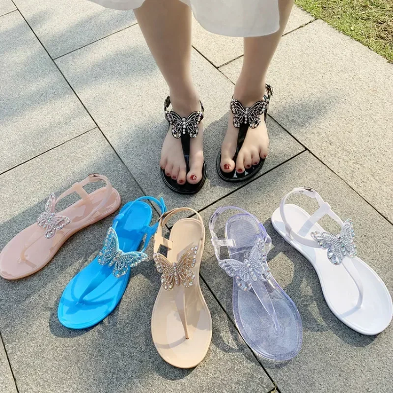 2024 novo verão feminino plana praia brilhando strass borboleta sandálias t-cinta tanga flip flops chinelos sapatos femininos