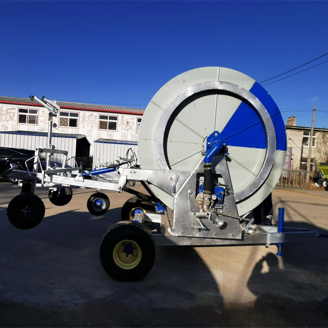 New Type Water Hose Reel Irrigation System Travelling Wheels Watering Machine With Spray Gun In Farm