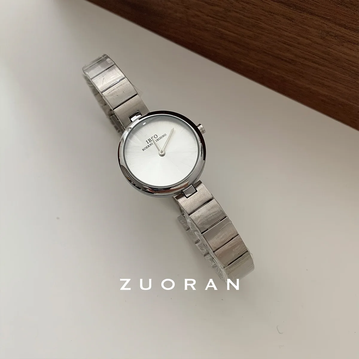 

Elegant women's watch, silver round, stylish and minimalist, high-end quartz watch, clock watch for women, an unusual timepiece.
