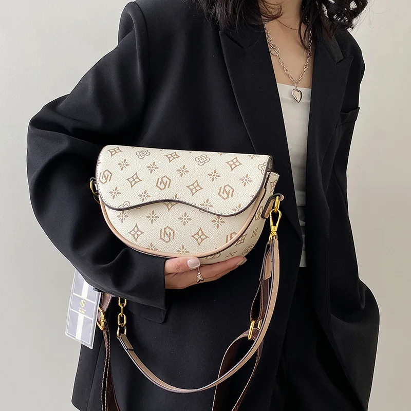 

2025 New Niche High - Quality Women's Fashion Printed Saddle Bag - Versatile Underarm, Single Shoulder & Crossbody Design