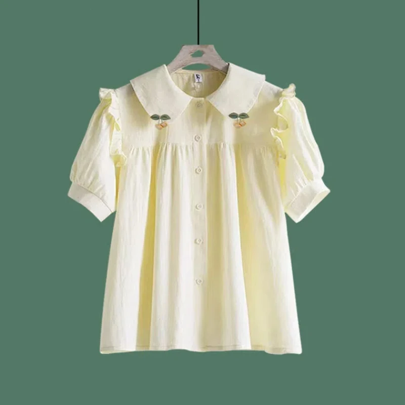 

Korean Commute 2024 Summer New Blouse Women's Solid Color Spliced Ruched Ruffles Button Loose Sweet Doll Neck Short Sleeve Shirt