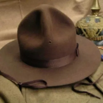 Wool Hat with Ribbon Decoration