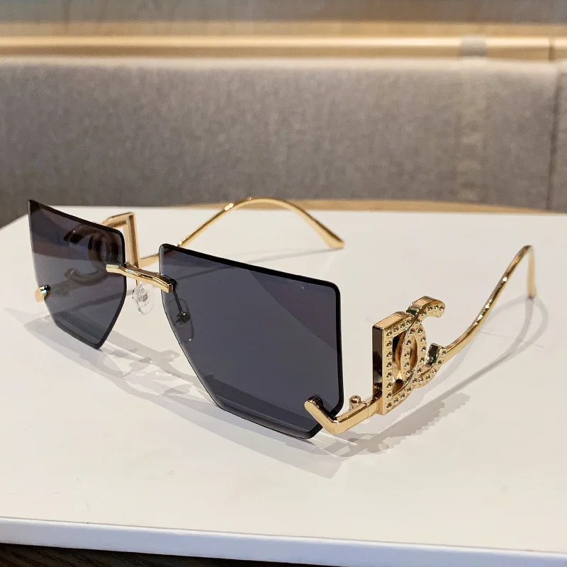 

New Luxury Designer Rimless Sunglasses Unisex Fashion Punk Style Women Gradient Lens UV400 Outdoor Fashion Eyewear vintage