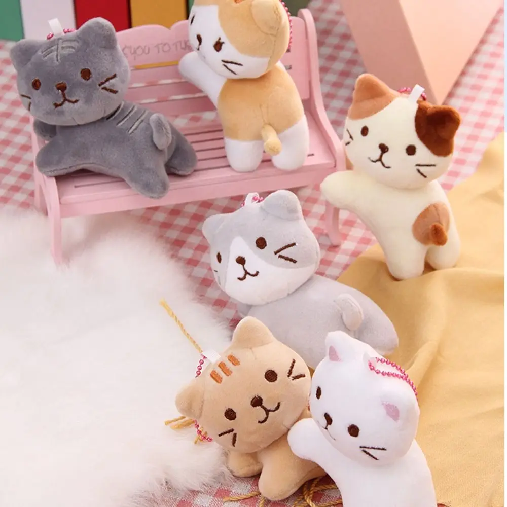 Boucle de clé chat mignon en peluche pendentif sac à dos breloques en peluche tête tordue chaton porte-clés Style coréen dessin animé poupée pendentif