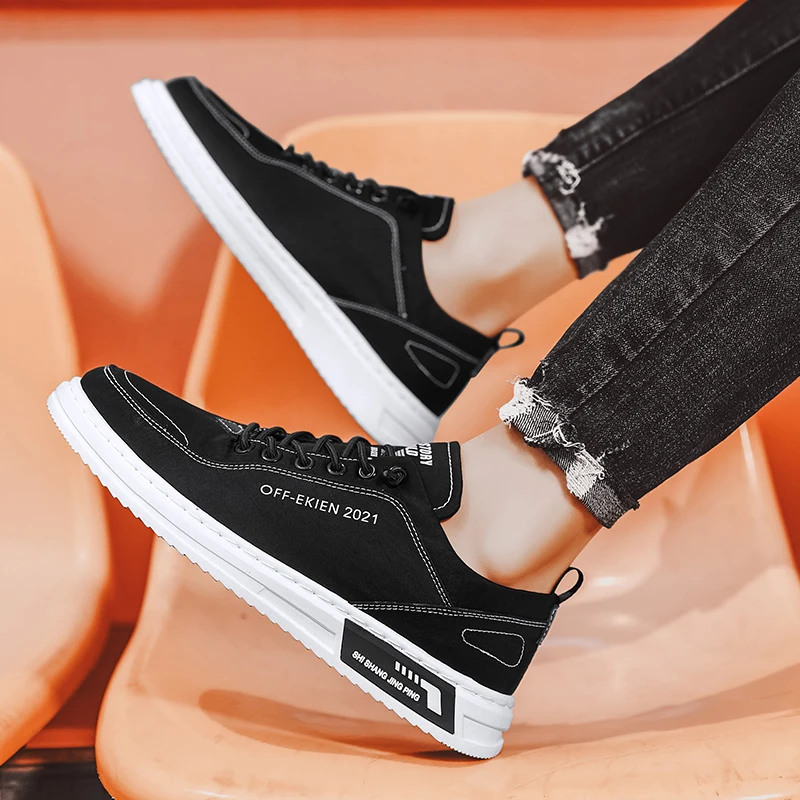 حذاء قماش الرجال أحذية رياضية عادية تنفس المشي الشقق الدانتيل متابعة سكيت المدربين موضة خفيفة الوزن رجل أحذية مفلكنة