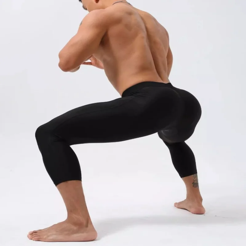 مثير رجل اللياقة البدنية زائد حجم Sweatpants 3/4 السراويل مرونة عالية النمط الأمريكي السراويل سكيت السراويل الرياضية الطويلة