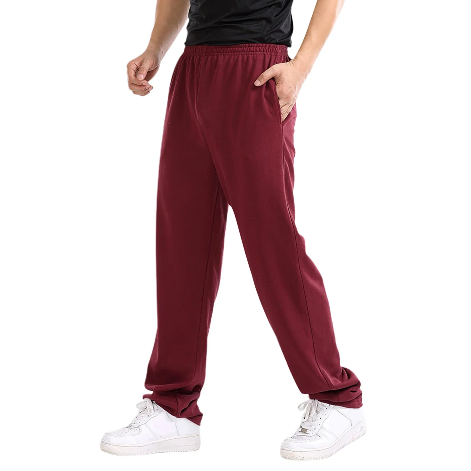 Pantaloni da jogging da uomo pantaloni sportivi autunnali primaverili pantaloni larghi elastici solidi con tasche abbigliamento sportivo pantaloni da tuta da uomo