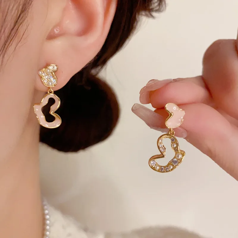 Korean Version Commuting Fashion Design with Asymmetrical Drop Oil Zircon Heart Exquisite Versatile Unique Earrings.