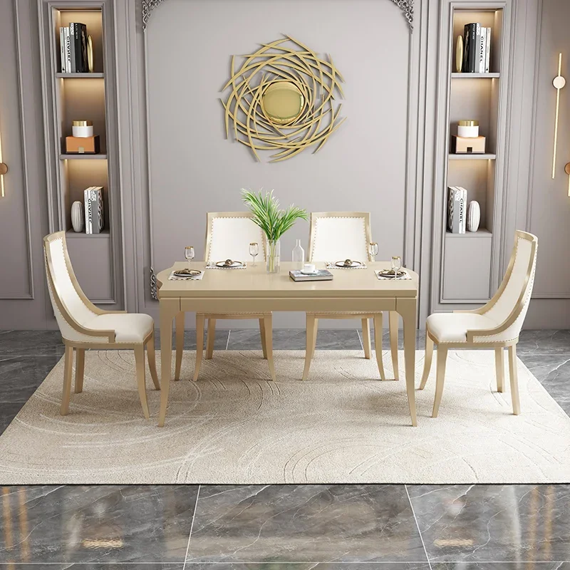 

Small apartment villa home dining table and chair combination simple solid wood rectangular champagne gold dining table