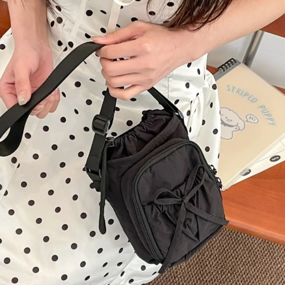

Fashion Bow Water Bottle Bag Nylon Solid Color Phone Crossbody Bag Korean Style Drawstring Water Cup Bag Outdoor