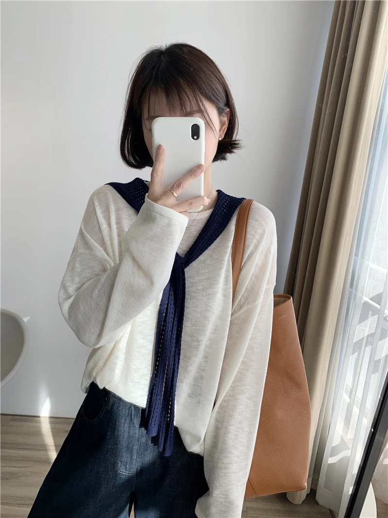 

Корейский вязаный топ из ледяного шелка с имитацией двухслойности, простой, с круглым вырезом, для женщин, ранняя осень, тонкий, свободный, стройнящий, базовый.