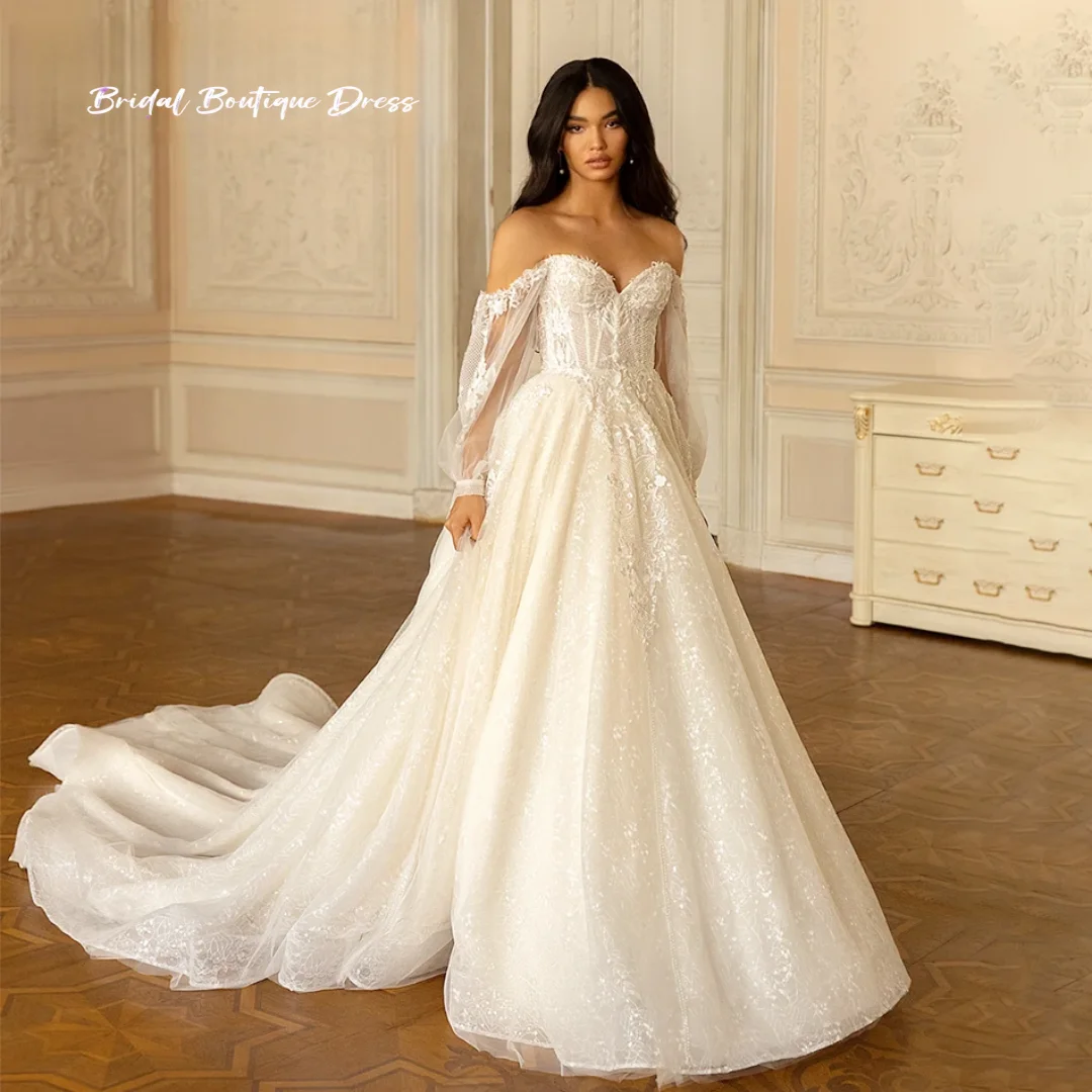 カスタマイズされたエレガントなAラインのウェディングドレスビーズレースアップリケ花嫁恋人バックレスパフスリーブプリンセスブライダルドレストレーン