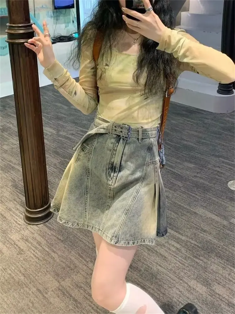 

Американская плиссированная джинсовая юбка для женщин: сексуальная, универсальная, стройнящая, больших размеров, винтажная, рваная, с высокой талией, короткая, летняя