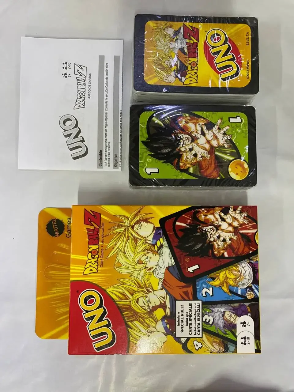 Mattel Games UNO Dragon Ball Z Card Game for Family Night Featuring Tv Show Themed Graphics and a Special Rule for 2-10 Players