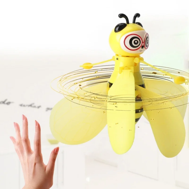 Intelligente sensor Infrarood handinductie Vliegtuigen USB Opladen Bijenvorm Speelgoed met licht