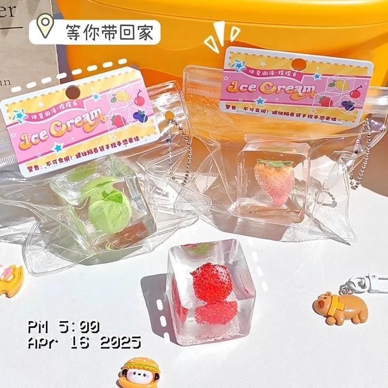 アイスキューブ＆フルーツスクイーズキッズドールキーホルダー - 鼻くそ型ストレス解消おもちゃ、ゆっくり戻る必須アイテム