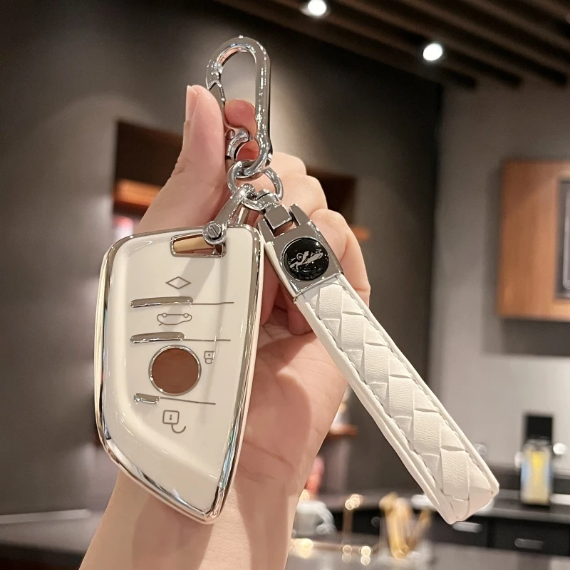 حافظة مفاتيح السيارة غطاء مفتاح حامل سلسلة المفاتيح الجلدية لسيارات BMW X1 X2 X3 X4 X5 غطاء مفتاح BM 1 Series 2 3 4 5 6 7 Series